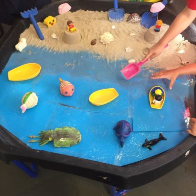 Creating a beach scene from card and sand